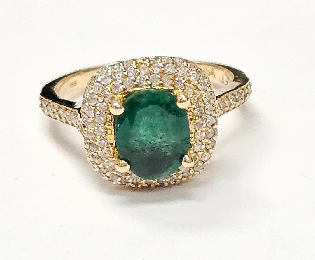 Emerald with diamonds ring in 14K Yellow Gold