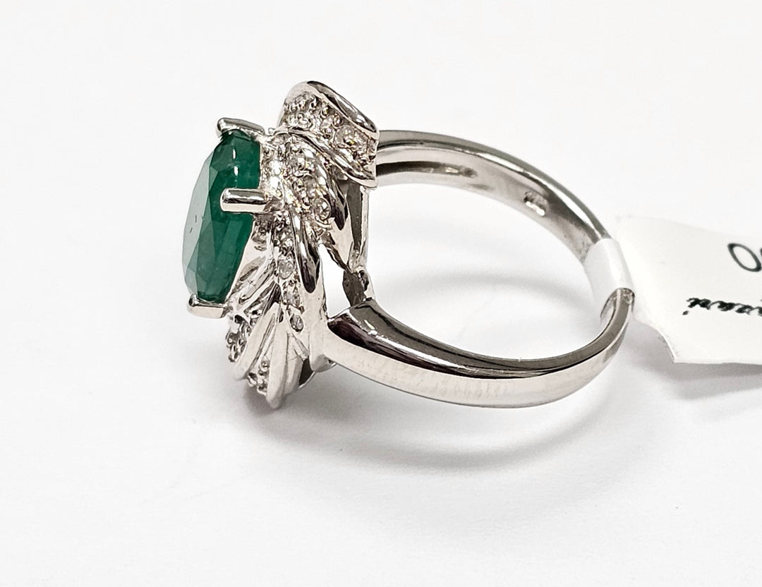 Emerald with diamonds ring in 14K White Gold